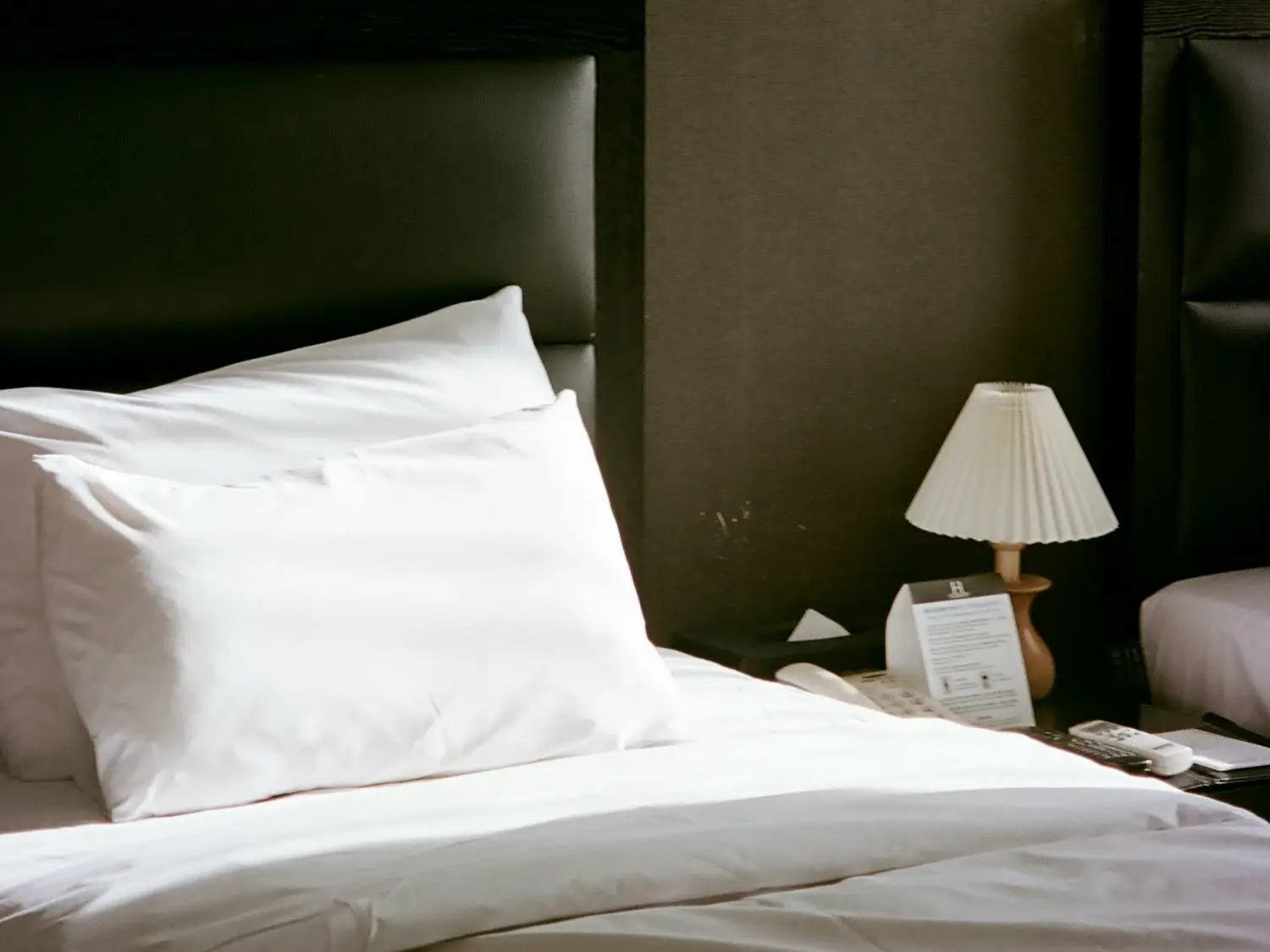 Bedroom prepared with fresh linen between guest stays — PLACEHOLDER image
